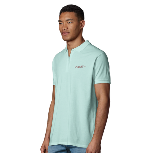 Men's polo shirt in light teal on model with short sleeves and button placket, chest logo