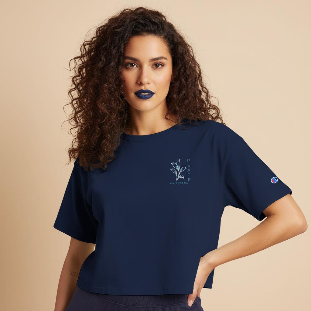 Women’s cropped heritage t-shirt in navy with chest graphic and Champion logo on sleeve