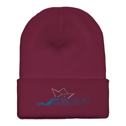 Cuffed beanie with boat and waves logo, maroon knit front.