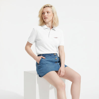 White unisex polo shirt with collar, button placket, short sleeves, and Love chest logo