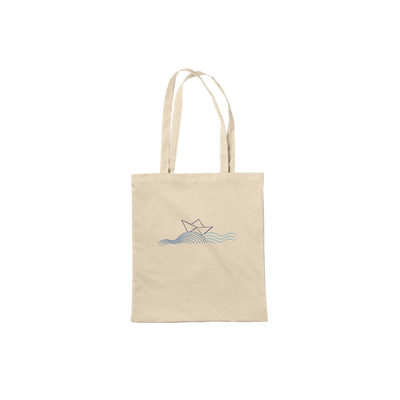 Natural tote bag with handles and sailboat over blue wave print
